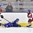 PLYMOUTH, MICHIGAN - April 3: Czech Republic's Lucie Povova #13 and Simona Studentova #11 watch as the puck fly's away while Sweden's Fanny Rask #20 lays on the ice after being checked during preliminary round action at the 2017 IIHF Ice Hockey Women's World Championship. (Photo by Minas Panagiotakis/HHOF-IIHF Images)